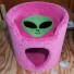 Shown here in carnation pink, with mauve background / interior & grass green alien face