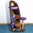 53" in chocolate carpet w/ purple clematis, olive green base, 2 tree fungus steps in toffee, dark purple/lavender mushroom w/ manila rope, lavender draping moss, sparse moss on base, 2 toys & 1 butterfly