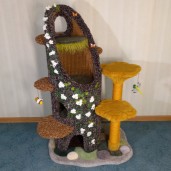 53" height, 16" diameter stump with carpet folds, draping moss, English ivy/jasmine, sparse moss/3 stones, 2 butterflies & 2 toys