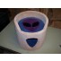 Shown here in beige, with sky blue background / interior & purple alien face