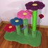 Shown here with grass green base/posts & matching sisal.  Flowers are raspberry, sky blue, carnation pink, and plum. Toys shown are ladybug and dragonfly.