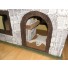 The fireplace & bearskin rug from outside through the doorway on the side, opposite the balcony side.