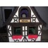 The cat name under the attic window is hand-stitched with nylon yarn.  One of your cat's names would be placed here in the same way.