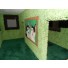 Another view of the 3rd floor smaller room which leads out to the balcony. Here, the kitty portrait can be seen through a window on the front of the house.