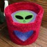 Shown here in cranberry, with lavender background / interior & grass green alien face.  Also with heart opening.