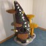 53" height, 16" diameter stump with carpet folds, draping moss, English ivy/jasmine, sparse moss/3 stones, 2 butterflies & 2 toys