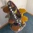 53" height, 16" diameter stump with carpet folds, draping moss, English ivy/jasmine, sparse moss/3 stones, 2 butterflies & 2 toys